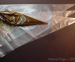 small piping bag for henna paste filling by hennaya naturals , a1 henna